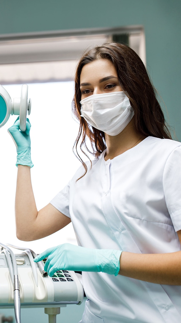 Young dentist at work